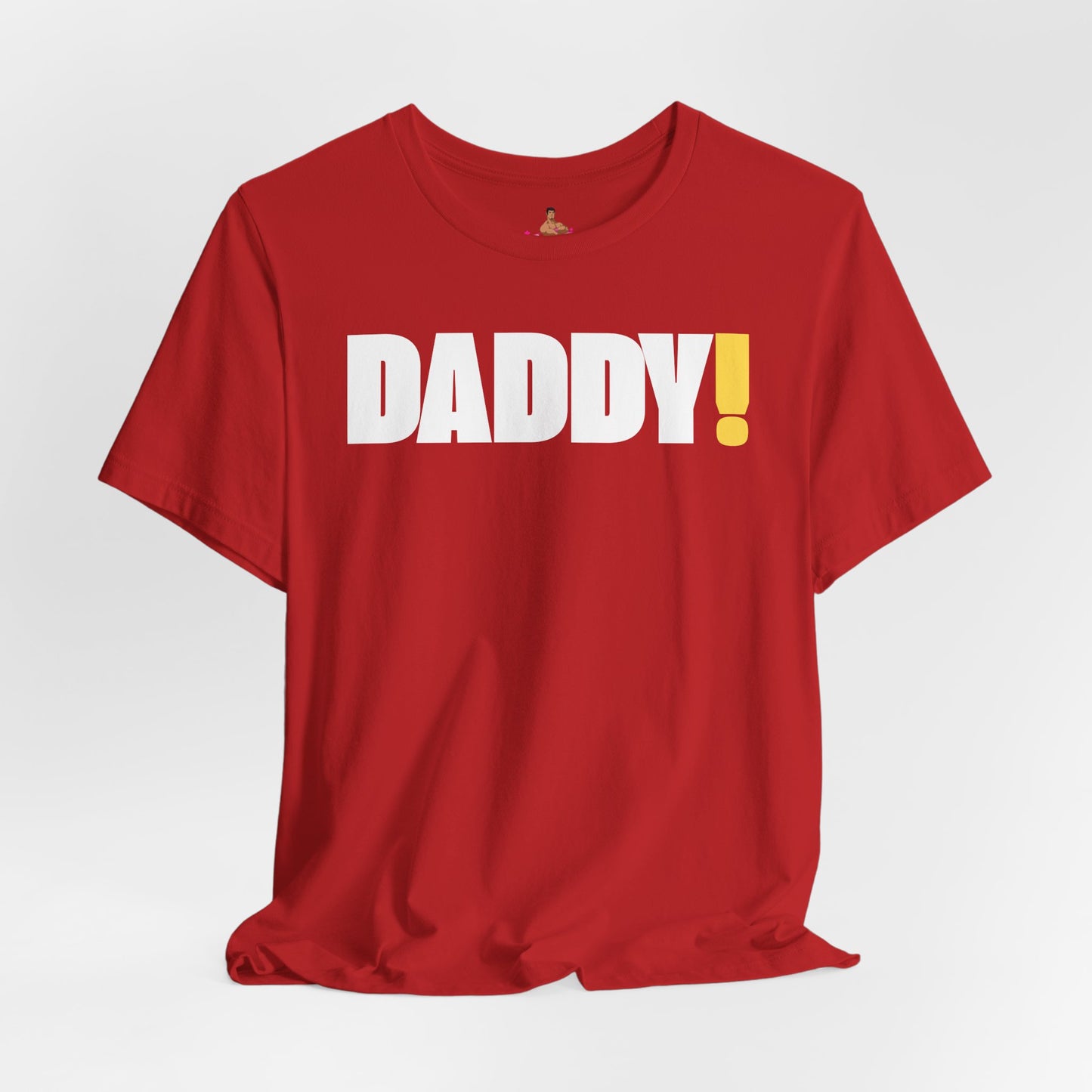 Man wearing a black t-shirt with 'DADDY!' text against a dark background LGBTQIA+ Kink Positive