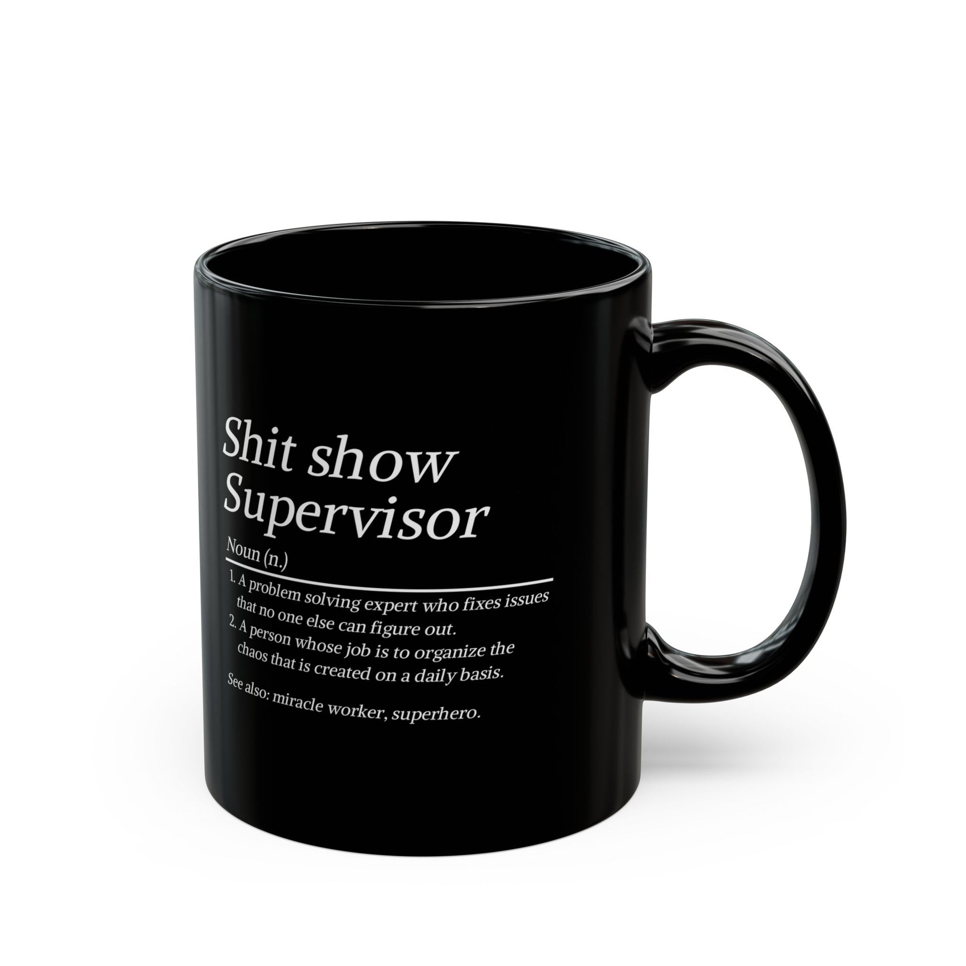 Black mug with text definition on a white background