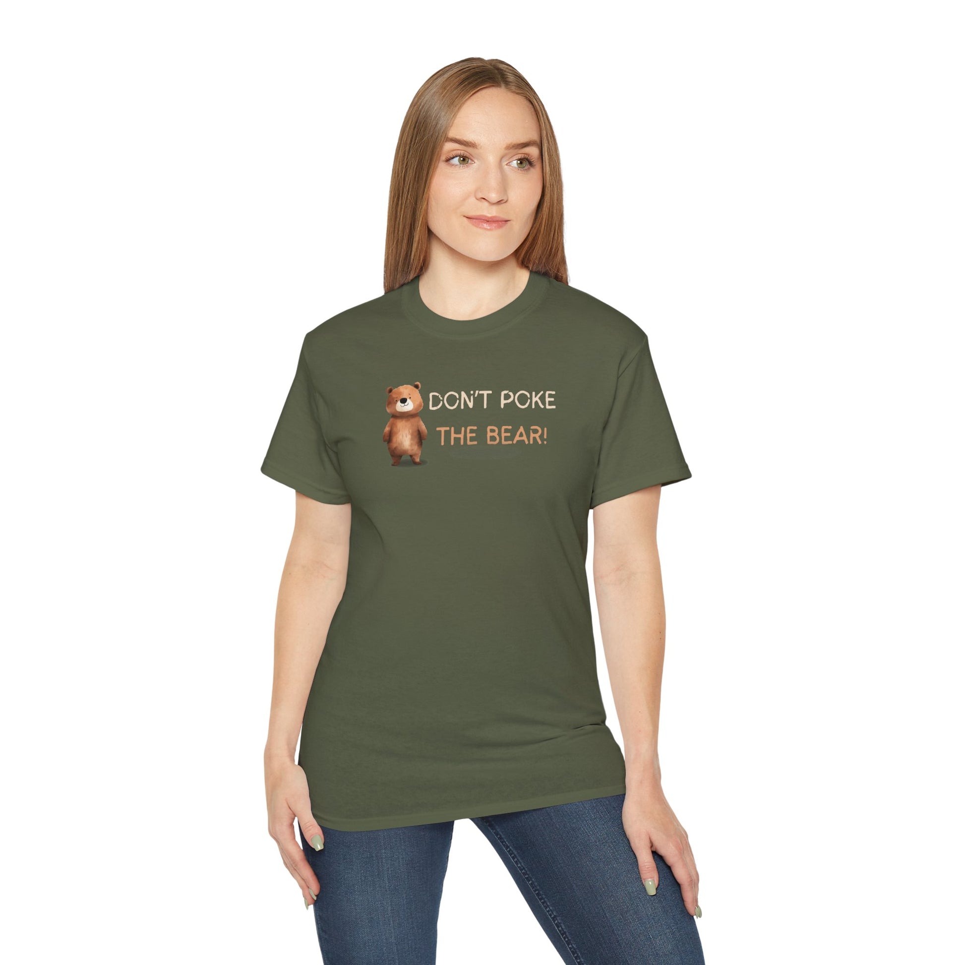 Person wearing a green t-shirt with 'Don't Poke the Bear' text and bear graphic.