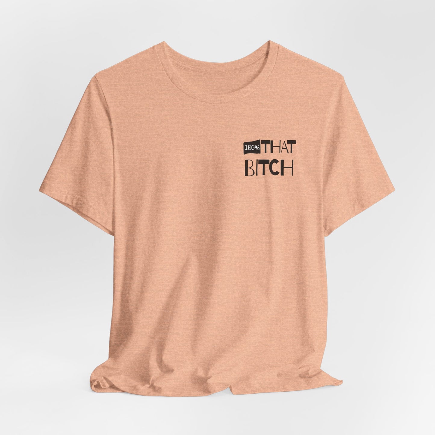 Beige t-shirt with graphic text on a light gray background  100% that Bitch