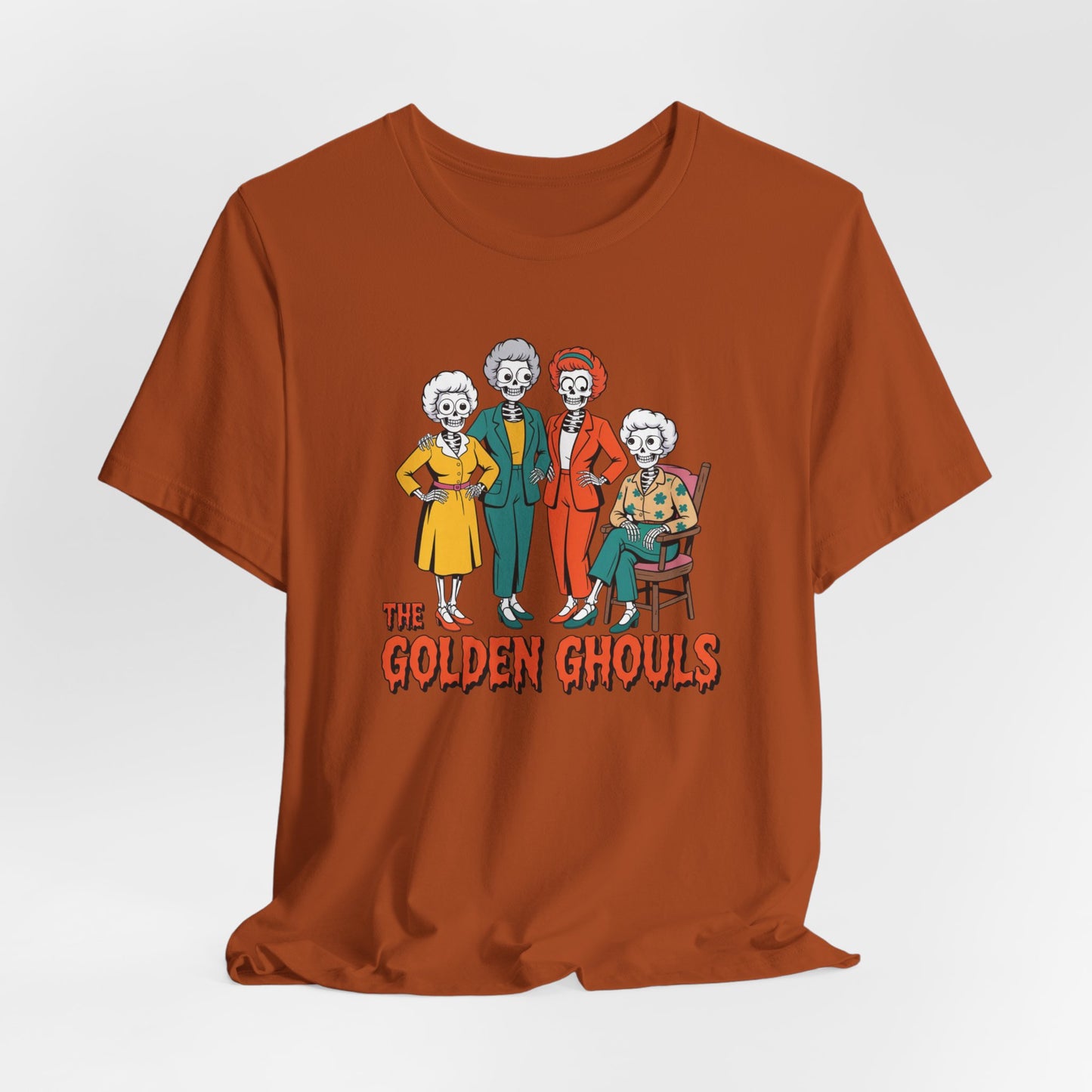 Brown t-shirt with 'The Golden Ghouls' graphic design on a white background   Golden Girls, 80s TV, Halloween Tees