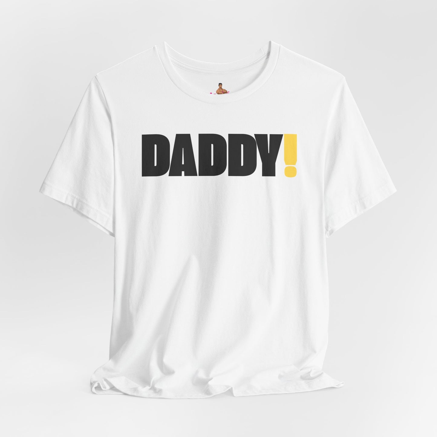 Man wearing a black t-shirt with 'DADDY!' text against a dark background LGBTQIA+ Kink Positive