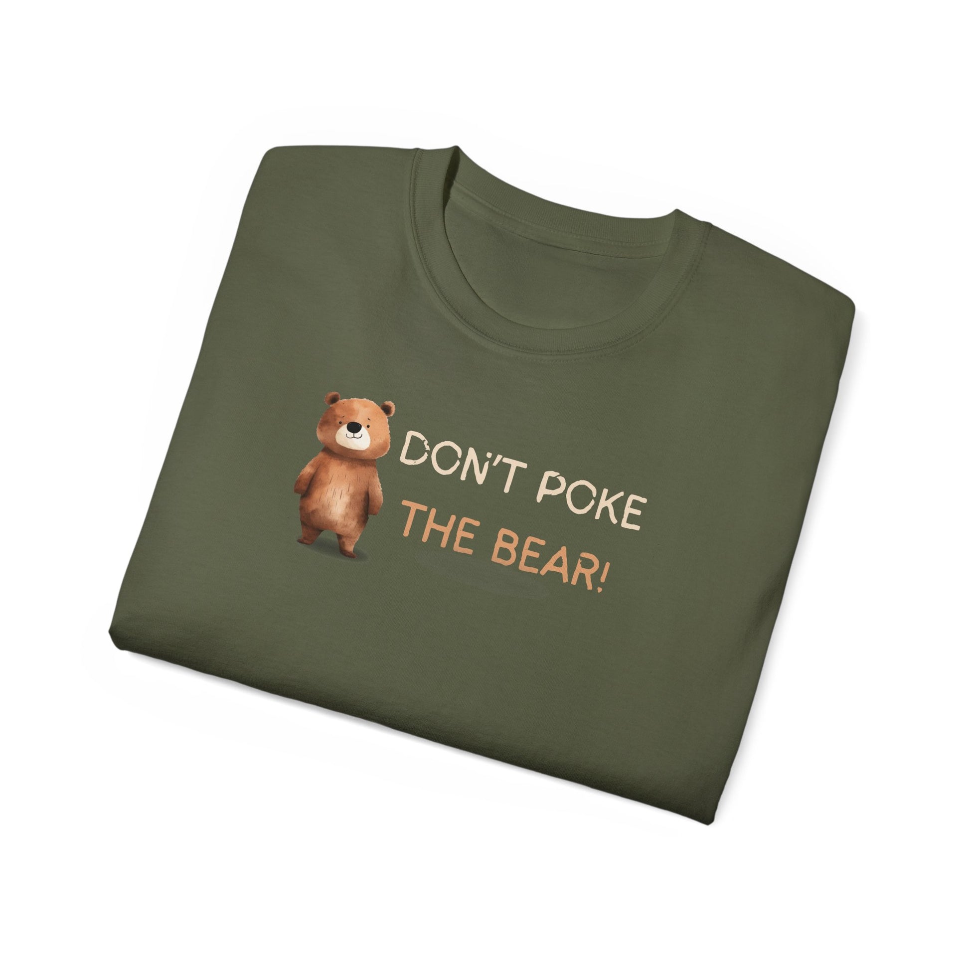 Folded green t-shirt with a bear graphic and text on a white background