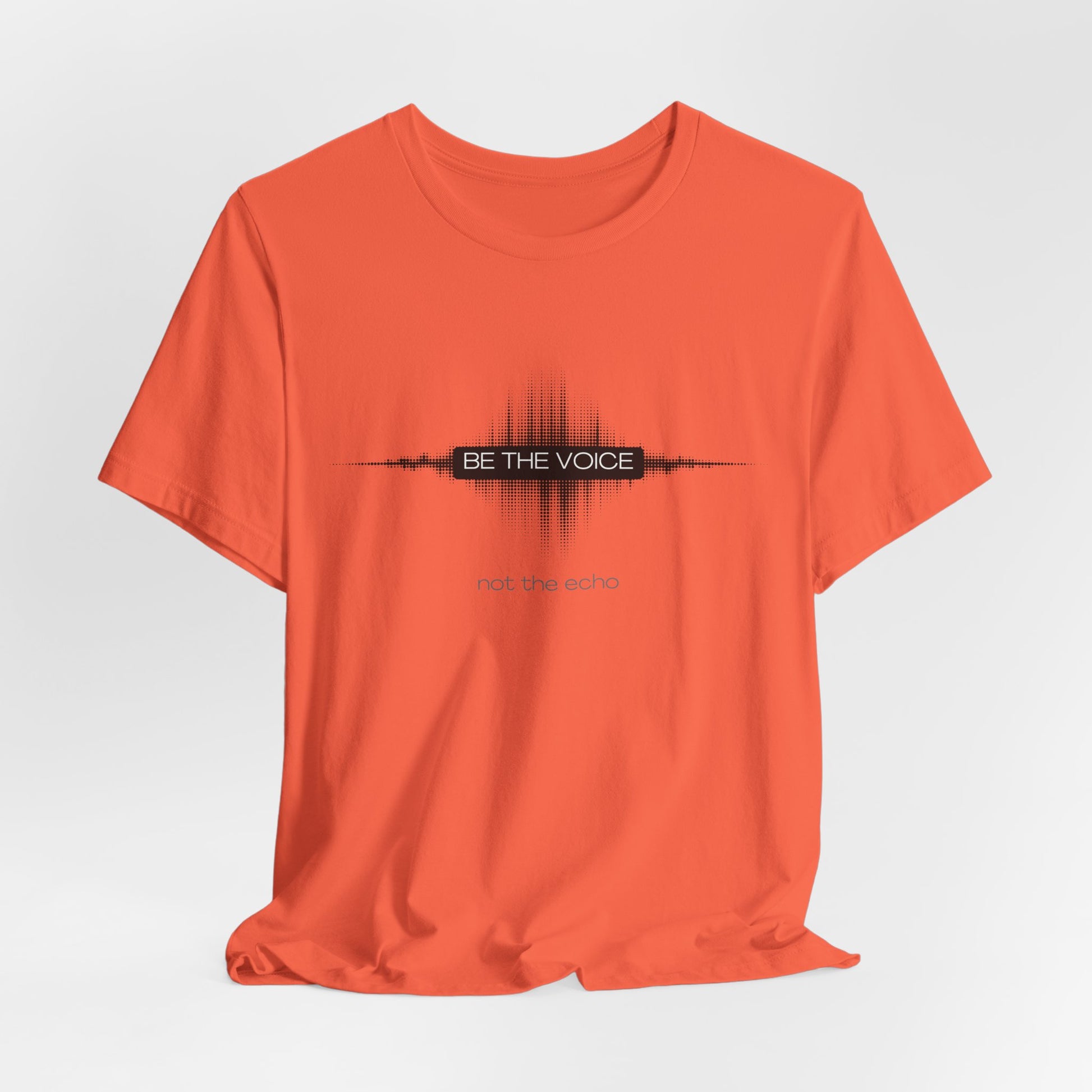 Orange t-shirt with 'Be the Voice' text design on a white background