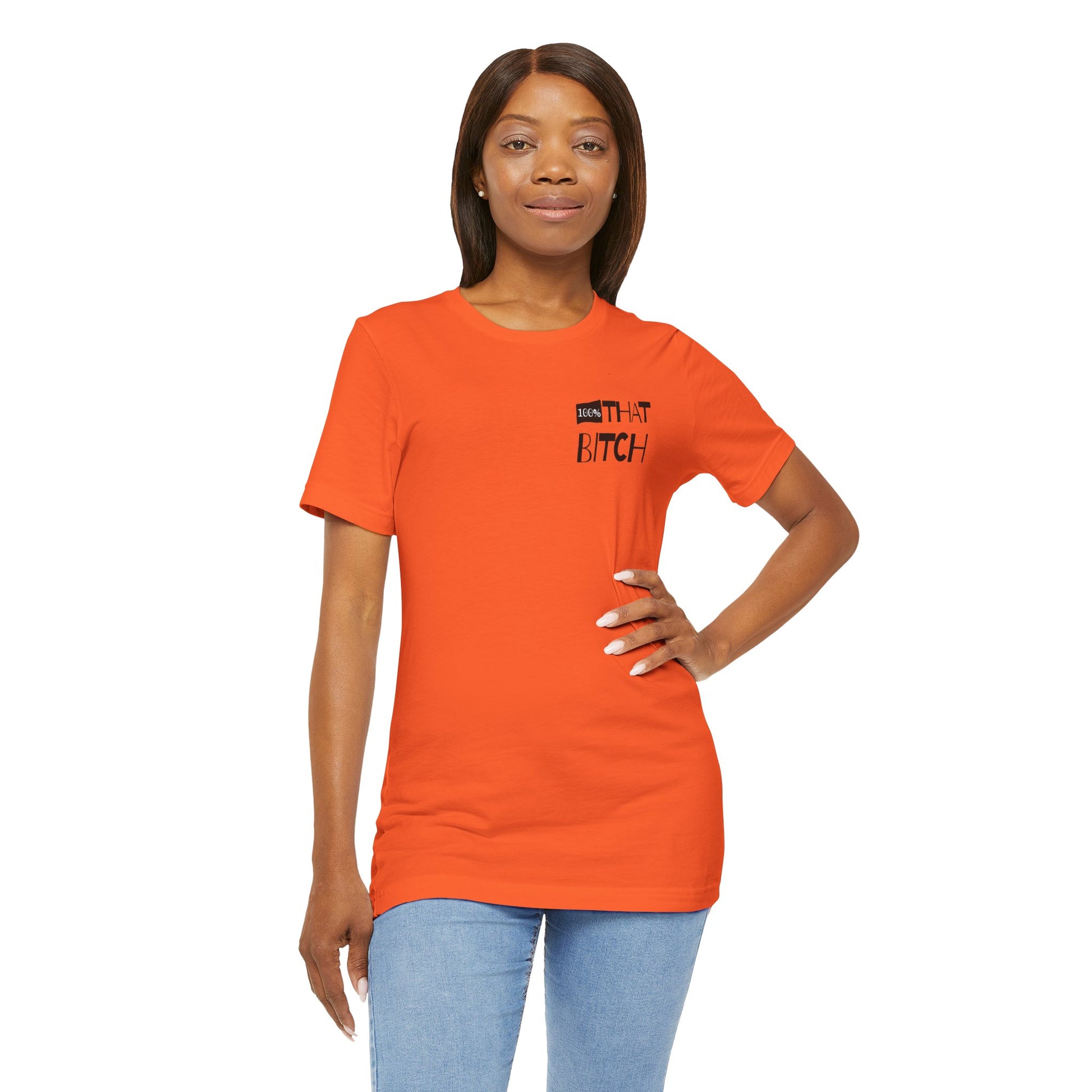 Woman wearing an orange t-shirt with text on a white background  100% that Bitch