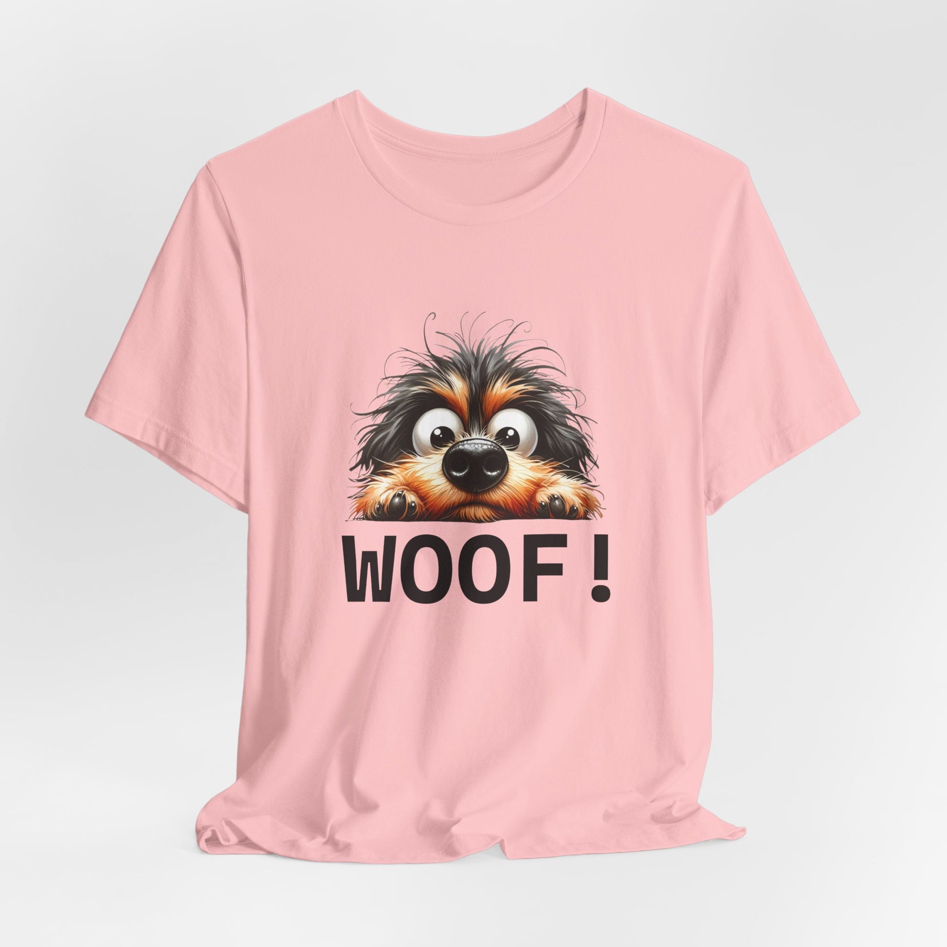 Pink t-shirt with a dog graphic and 'WOOF!' text on a light gray background