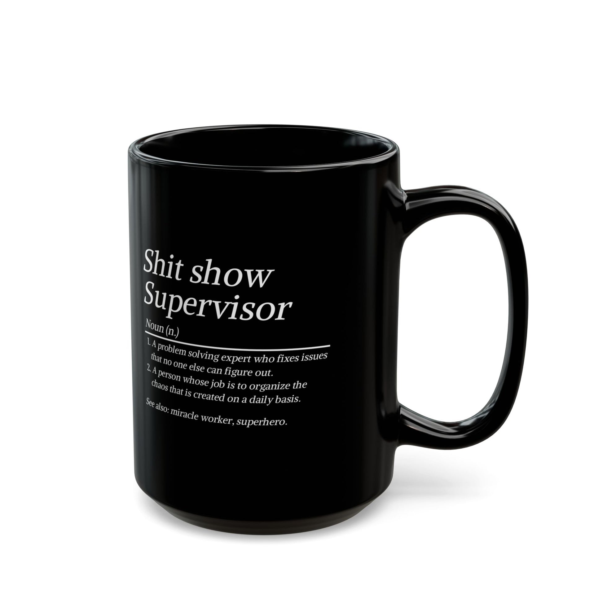 Black mug with white text on a white background
