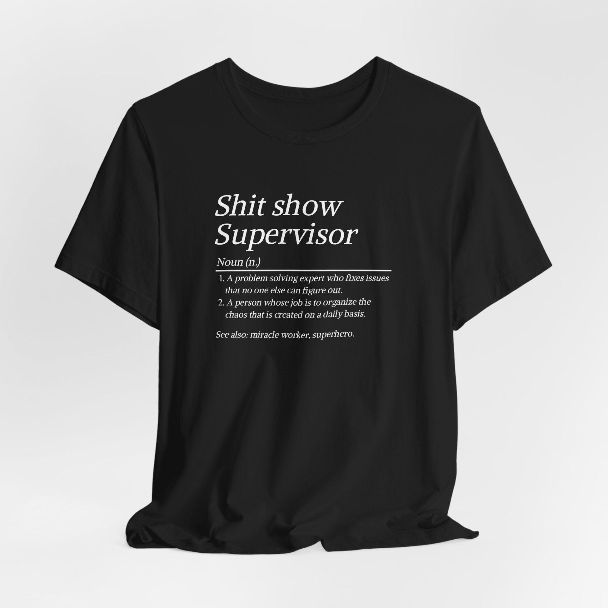 Black t-shirt with white text on a light gray background