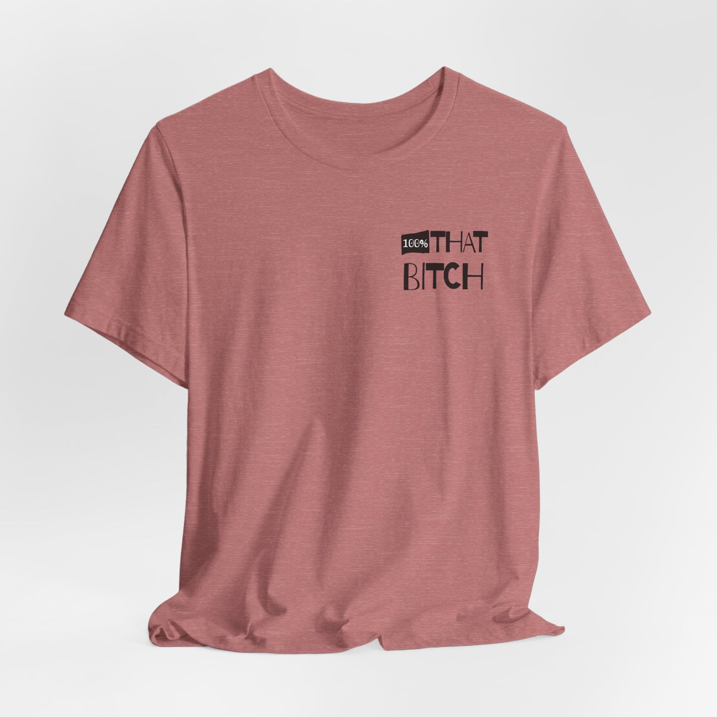 Pink t-shirt with graphic text on a white background  100% that Bitch